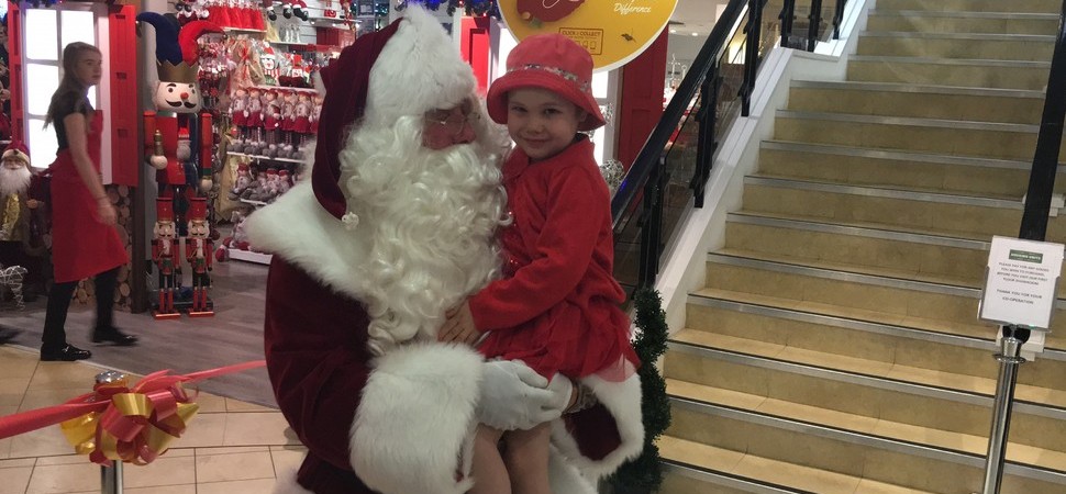 Childhood cancer patient opens Housing Units Christmas department